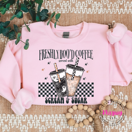 Light Pink crewneck sweatshirt with the ghost iced coffee Halloween design