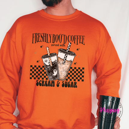 Orange crewneck sweatshirt with the Freshly Boo'd Coffee spooky coffee cups print
