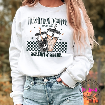 White heavyweight crewneck with a fun Scream and Sugar Halloween coffee design.