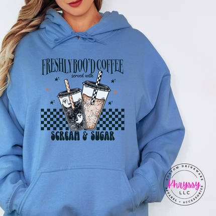 Carolina Blue hoodie with the Freshly Boo'd Coffee spooky coffee cups print