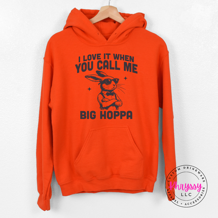 Orange hoodie with the call me big hoppa print