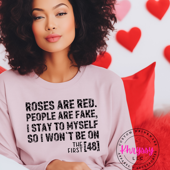 Woman wearing a funny Valentine's sweatshirt with a humorous quote.