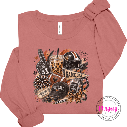 Mauve long sleeve tee with the game day helmet and leopard cup graphic