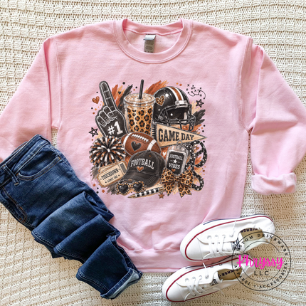Light Pink crewneck sweatshirt with the game day helmet and leopard cup graphic