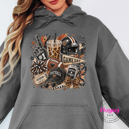 Charcoal hoodie with the game day helmet and leopard cup graphic