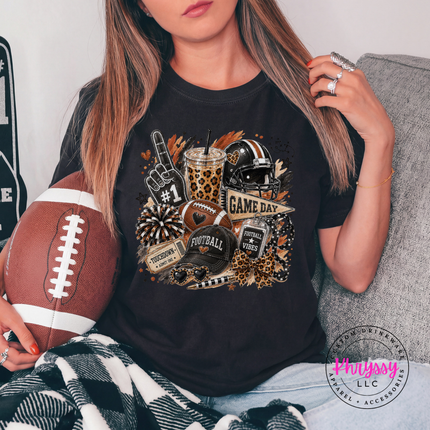 Woman wearing a Black tee with the leopard football game day design
