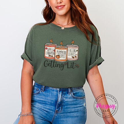 Sage tee with the Getting Lit fall candles graphic