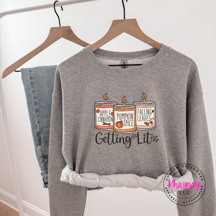 Sport Grey crewneck sweatshirt with the Getting Lit fall candles graphic