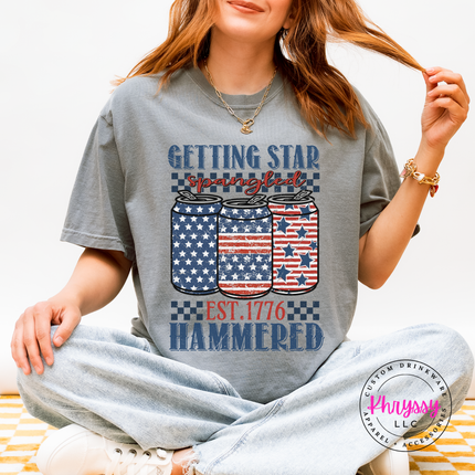 Granite garment-dyed tee featuring a distressed patriotic beer-can print in navy and red.