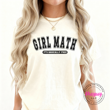 Ivory tee worn outdoors, highlighting the black varsity Girl Math text.