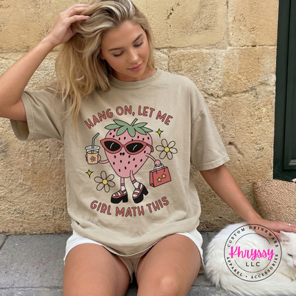 Girl math strawberry tee shown in Sandstone, styled for a casual day out.
