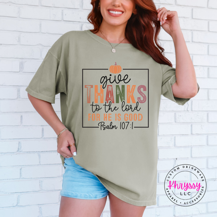 Khaki tee with the faith based give thanks scripture graphic

