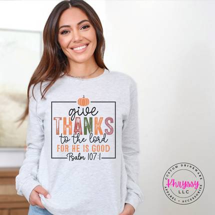 Ash Bella+Canvas long sleeve with a Give Thanks Psalm 107 graphic.
