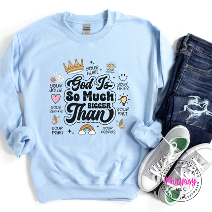 Light Blue crewneck sweatshirt showing a black God Is So Much Bigger Than faith print.