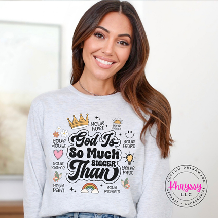 Ash long sleeve tee with a God Is So Much Bigger Than faith graphic.