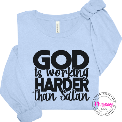 Baby Blue long sleeve tee featuring a faith statement in block and script