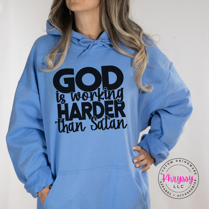 Carolina Blue hoodie featuring a faith statement in block and script print