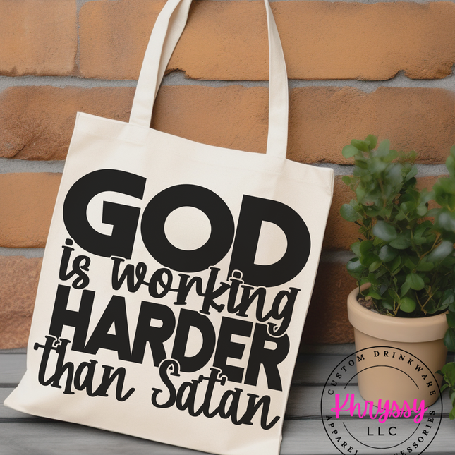 God is Working Harder Canvas Tote Bag