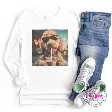 White long sleeve shirt with a dog graphic, blue jeans, and white sneakers on a white background.