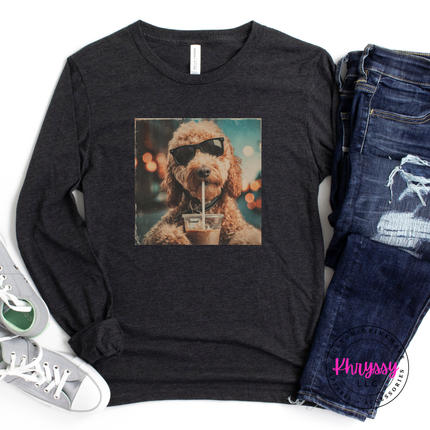 Dark gray long sleeve tshirt with a graphic of a dog drinking a milkshake, paired with jeans on a white background.