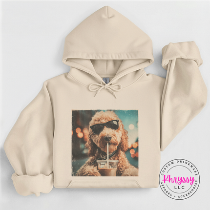 Sand hoodie with a dog wearing sunglasses and drinking from a straw on a white background, featuring the brand 'Phrysy'.