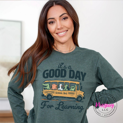 heather forest green tee with muted alligator, duck, and turtle bus print.