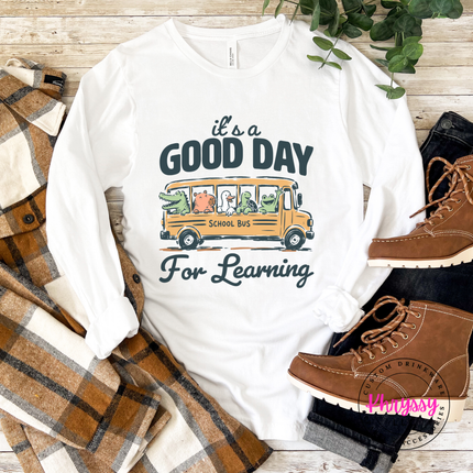 White cotton shirt with school bus animal friends.