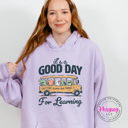 Orchid cozy hoodie with muted alligator and duck bus print.