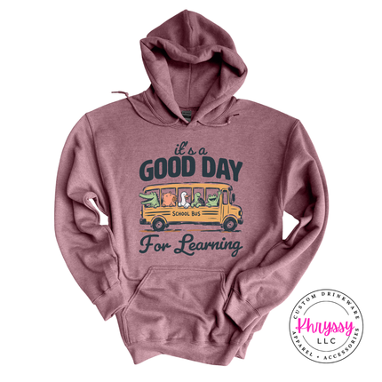 Heather dark maroon Gildan hoodie featuring Good Day For Learning bus graphic.