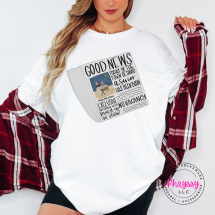 Flat lay of the Good News nativity Christmas tee in White.