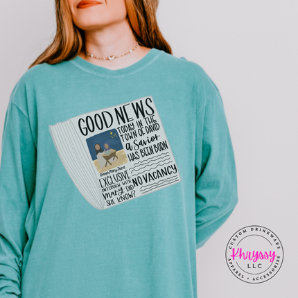 Close up of the Good News nativity art on a Chalky Mint long sleeve tee.