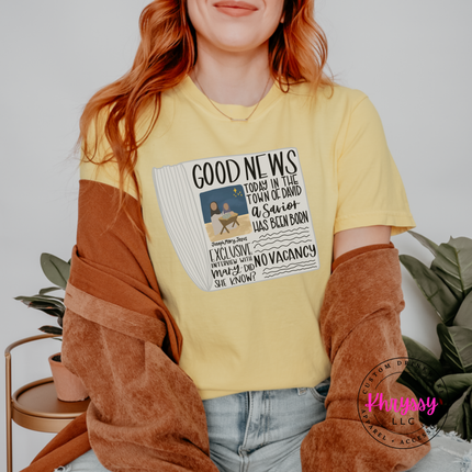 Model wearing the Good News nativity tee in Butter.
