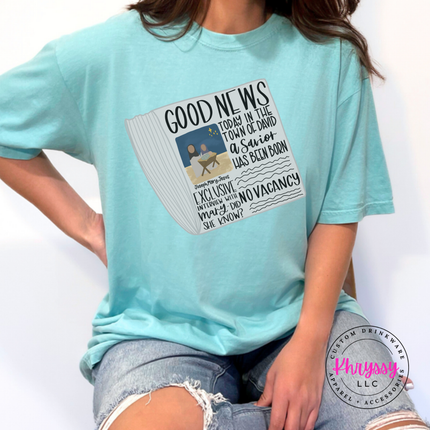 Close up of the Good News nativity art on a Chalky Mint tee.
