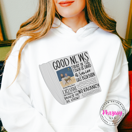 Flat lay of the Good News nativity Christmas hoodie in White.