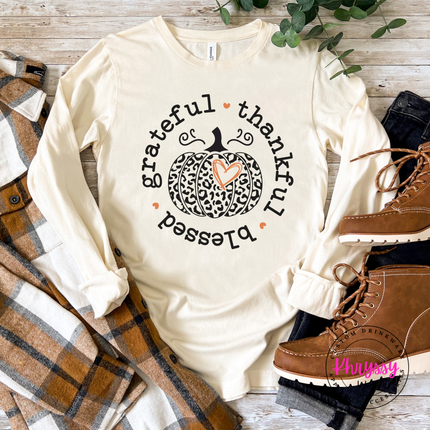Natural long sleeve tee with the thankful and blessed circle pumpkin graphic
