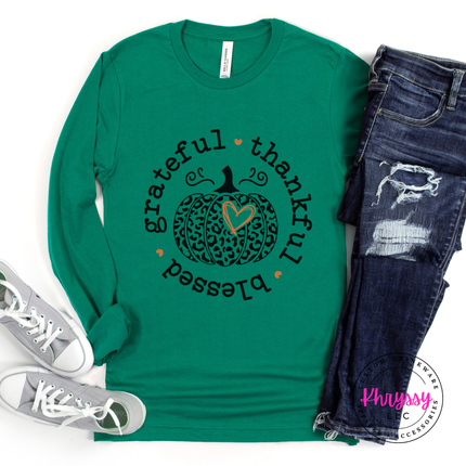 Kelly long sleeve tee with the thankful and blessed circle pumpkin graphic