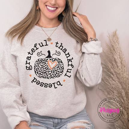 Ash crewneck sweatshirt with the grateful thankful blessed leopard pumpkin graphic
