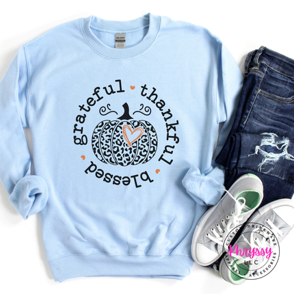 Light Blue crewneck sweatshirt with a leopard pumpkin design.