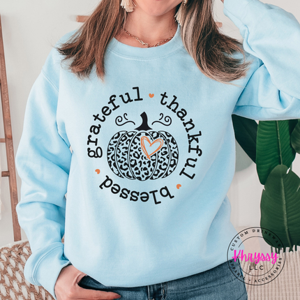 Light Blue crewneck sweatshirt with the thankful and blessed circle pumpkin graphic