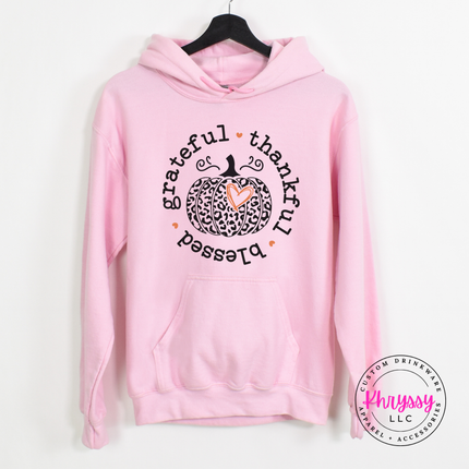 Light Pink hoodie with the grateful thankful blessed leopard pumpkin graphic