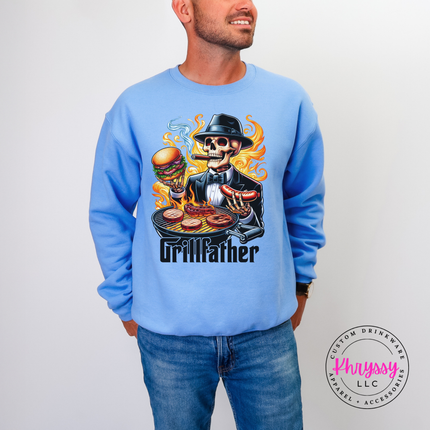 Carolina Blue crewneck showing a cigar-smoking skeleton at a flaming BBQ grill.