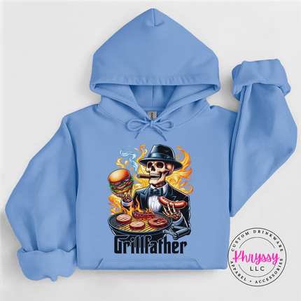 Carolina Blue hoodie showing a cigar-smoking skeleton at a flaming BBQ grill.