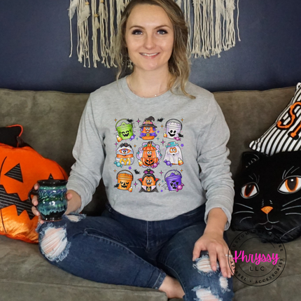 Woman wearing an Athletic Heather tee with a candy bucket design.