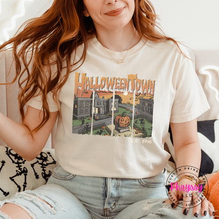 Ivory Comfort Colors tee styled for fall with a spooky town graphic.