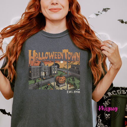 Pepper pigment-dyed tee with a moody Halloween town design.