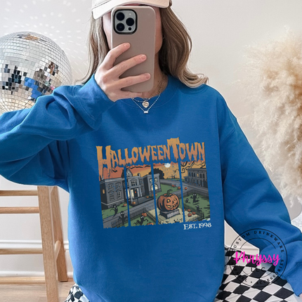 Sapphire crewneck sweatshirt with the Halloween town vintage scene graphic