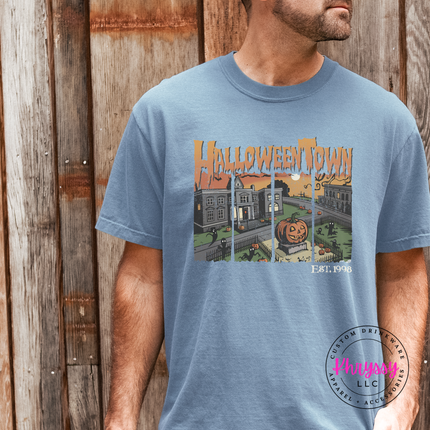 Woman wearing a Blue Jean tee with the retro Halloween town est 1998 design
