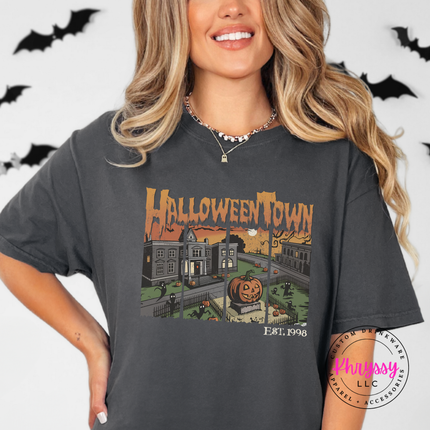 Graphite garment-dyed tee with a nostalgic Halloweentown print.