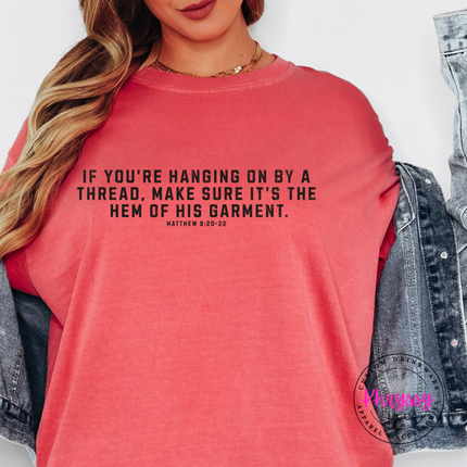 Watermelon tee with the hem of His garment verse in white lettering