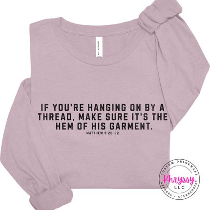 Light Violet long sleeve tee with the hem of His garment Christian verse in black